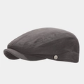 Detail of the silver brand emblem on a dark grey charcoal cotton flat ivy cap for men - Adjustable / Dark Gray