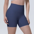 Vue détaillée du short de yoga bleu foncé à taille haute avec large bande abdominale - S / Bleu marine