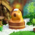 Cute Capybara resin figurine relaxing in a wooden bath bucket for car dashboard decor - Bathing Capybara (-059B)