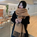 Chic camel-colored cashmere-like thick scarf with tassels worn in a cozy wrap style - Camel Brown