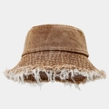 Detail of frayed fringe edges on brown washed denim wide brim bucket hat for women - M (56-58cm) / Coffee