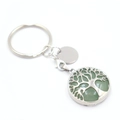 Silver tree of life keychain with green gemstone pendant on a clean white background - Green Aventurine