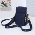 Navy blue nylon crossbody phone bag with quilted front pocket and gold zippers - Blue
