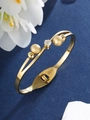 Detalle de brazalete de acero inoxidable dorado con circón blanco y cuentas doradas - Estilo de Doble Strass con Bola Dorada (D)