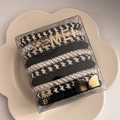 Detail of high-elasticity hair ties in a clear square box with gold brand text - 4# Black and White Patchwork Hair Tie Set