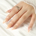 Pink aurora stiletto press on nails with pearl shimmer finish on silk background - Champagne Aurora Long Stiletto (JP2168)