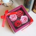 Soap flower gift box with four artificial roses in red and pink tied with a red ribbon bow - 4 Pieces / Two-tone Red