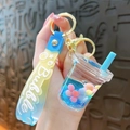 Portachiavi bubble tea blu con liquido e cinturino in gomma per borse - Blu