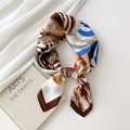 Artistic square silk scarf with blue and orange abstract tiger prints and knotted style - Tiger Leaf
