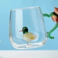 Cute glass mug with 3D green-headed yellow duck figure inside and a green handle - Duck