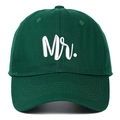 Detailed close-up of premium dark green cotton baseball cap with white Mr. embroidery - Forest Green MR