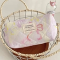 Macro view of floral quilted cotton makeup bag with yellow butterflies and pink bow - Dreamy Butterfly Octagonal Pouch - Purple