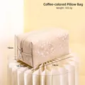 Elegant coffee-colored rectangle cosmetic bag with white floral patterns and M pendant - Coffee Pillow Bag