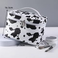 Portable cow print cosmetic bag with double metal zippers and top handle, 21.5x15.5x16.5cm - X-135 Large Square/Black White Cow Pattern