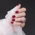 Close-up of glossy dark red square round press-on nails on hands with pearl decor - Dark Red (DFYL-10)