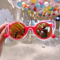 Kids heart bow sunglasses with red circular inner frame and orange reflective lenses - Red Transparent Frame