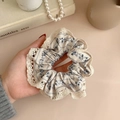 Beige floral wool scrunchie with blue patterns and delicate lace edge detail - White Lace Edge / Beige Floral