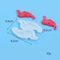 Detail of DIY heart puzzle silicone mold with dimensions 8.5cm and 6.6cm on blue background - 60-1116 Dragon Shape