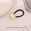 Minimalist elastic hair tie with polished gold metal curved ornament in 3.5cm size - Small Oval Gold