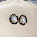 Vintage black enamel floral earrings with white oval pearl center and gold trim - Enamel Flower Pearl Oval Stud Earrings