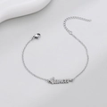 Macro detail of silver Cancer zodiac bracelet with adjustable chain and lobster clasp - Cancer Steel