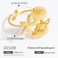 Golden stainless steel ocean ring featuring starfish, shell and conch designs - JZ21228-Triple Ocean Elements