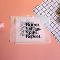 Pink frosted EVA zipper storage bag featuring volleyball typography print - Pattern 9-Volleyball Repeat