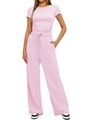 Détail macro du pantalon large à taille haute avec cordon de serrage et poches pratiques - Rose