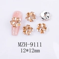 Detail of 12mm amber heart-shaped crystal flower nail gems with flat silver metal base - Five-Petal Flower Champagne Style (9111)