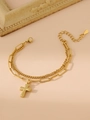 Detail of gold double-layer bracelet with cross pendant and heart-shaped tail charm - Gold Cross Double Layer Pendant Bracelet