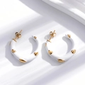 Chic white C-shaped hoop earrings with gold heart accents in stainless steel - White (ER-710)