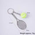 Mini tennis racket keychain with a bright green felt ball and silver metal frame - 2cm Small Fluorescent Green Tennis Ball + Silver Racket