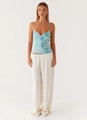 Detailed close-up of light blue sequined tank top with intricate floral beadwork - S / Tops / Blue