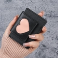 Mini heart-shaped cutout wallet in black lychee leather with pink interior detail - Black