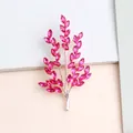 Elegant wheat stalk brooch with pink crystal leaves on a polished rose gold metal frame - Gold & Rose Red