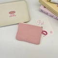 Detailed view of pink quilted cloud coin purse with metallic zipper and durable strap loop - Pink