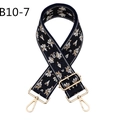 Close-up of dark blue jacquard shoulder strap with floral embroidery and gold metal hooks - B10-7/Gold