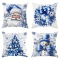 Detailed view of four ice blue Christmas pillow covers with festive snowman and tree prints - Ice Blue Fresh Christmas Set
