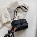 Chic black quilted leather crossbody bag with chain strap and gold clasp closure - Black