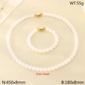 Set gioielli con collana e bracciale in perle di vetro bianco e chiusura dorata - Colore Oro (KS226886-Z)