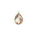 Macro shot of a faceted champagne teardrop birthstone crystal with gold metal edging - 6-Champagne
