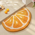 Semicircle orange slice bathroom rug made of non-slip absorbent tufted fiber - Lucky Orange