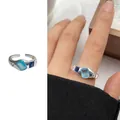 Adjustable S925 silver ring featuring asymmetrical blue gemstones and white zircon - 244 Colorful Zircon