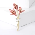 Elegant pink enamel tulip brooch with gold plating and sparkling crystal accents - Red