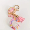 Pink glitter resin letter C keychain with pink butterfly pendant and silk tassel ornament - Letter C