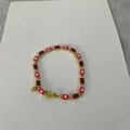 14K gold plated chain bracelet featuring magenta evil eye and red rectangular gemstones - Rose Red