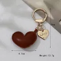 Brown leather heart keychain with golden Love charm and polished metal clasp 9cm - Brown