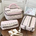 Quilted cotton pink and brown makeup bag set with jolly embroidery on wooden table - Fair Isle Cat