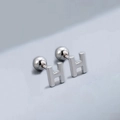 Polished silver stainless steel stud earring featuring a minimalist letter H design - Letter H (T55662) / Silver