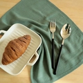 Modern black matte handle stainless steel fork and spoon set on a waffle cotton napkin - 30*40cm / Dark Green